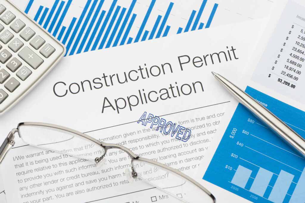 Image of pen and paper, featuring DataField Technology Services and highlighting 'Construction Permitting,' ensuring alignment with the page's context.
