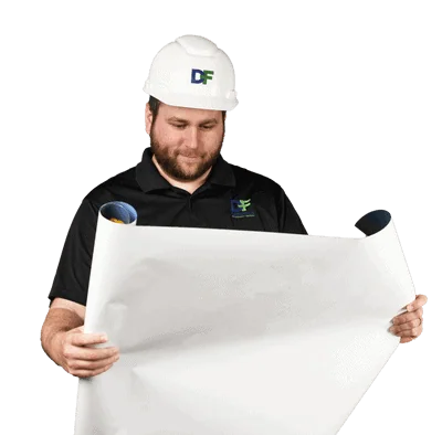 Portrait of a man with a confident expression, standing in front of the Datafield Technology Services logo. The man, identified as Telecom RFPs, appears to be a prominent figure associated with the company.