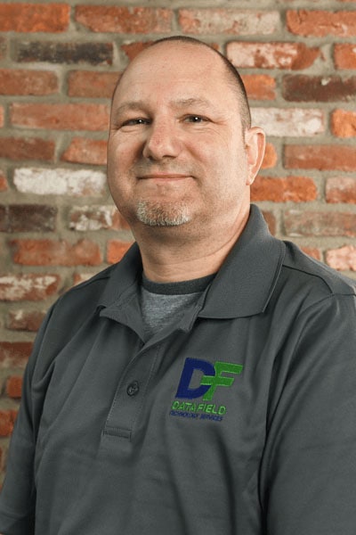 Visual of Brian Pack, a distinguished figure at Datafield Technology Services, showcasing his expertise and leadership within the organization. This image aligns seamlessly with the page's context, emphasizing Brian Pack's pivotal role in advancing technology services.